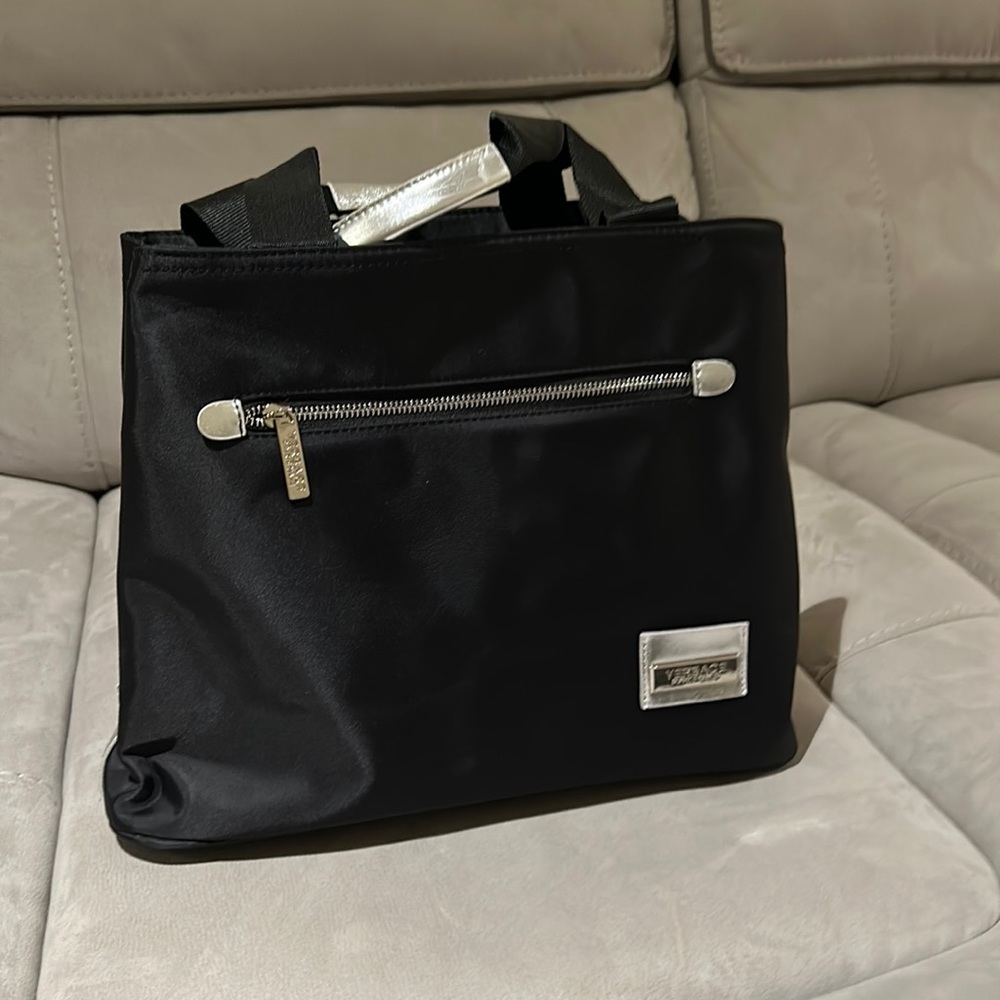 Unused black Versace carry all bag with strap